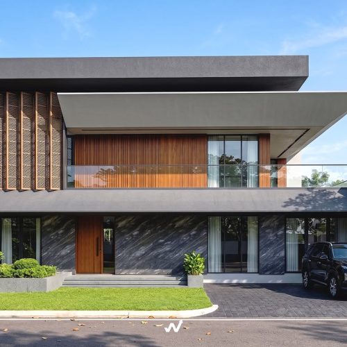 Desain Rumah Tinggal 2 lantai Modern KontemporerBangunan ini menonjolkan bentuk geometris yang t